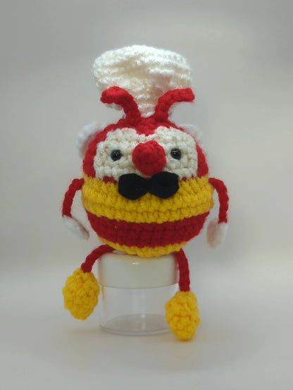 Crocheted soft toy of a bumble bee dressed like the mascot of popular Filipino food chain, Jollibee